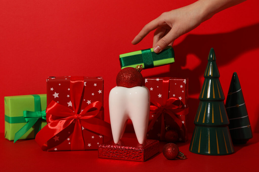 a tooth with a new year s decoration around it 2025 03 26 08 17 10 utc
