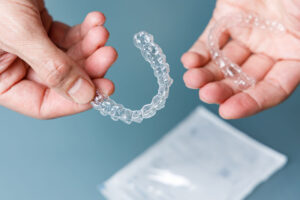 invisalign hand love to smile