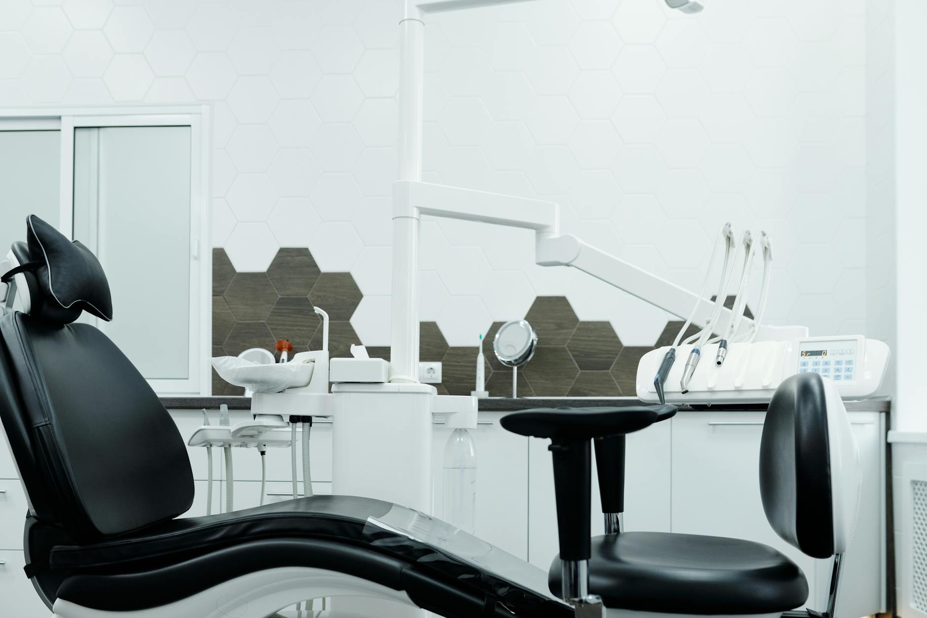 comfortable dental treatment room with soothing lighting and amenities