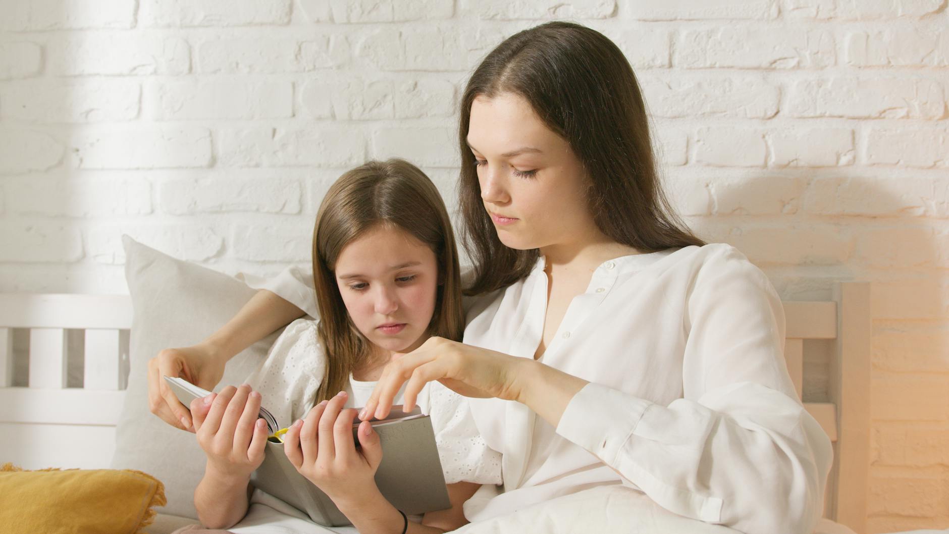 parent and child reading dental health book together