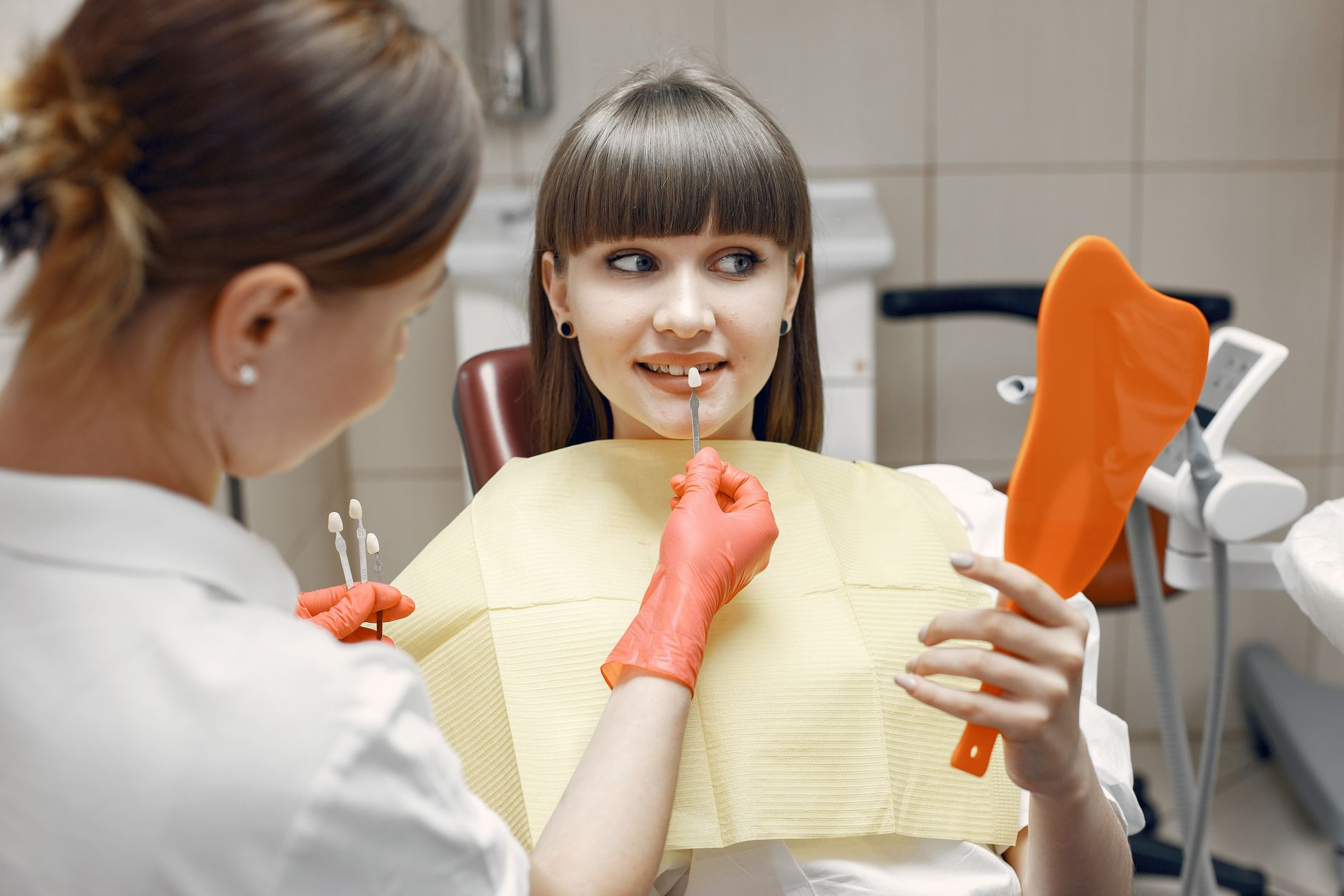dentist examining whitening toothpaste ingredients