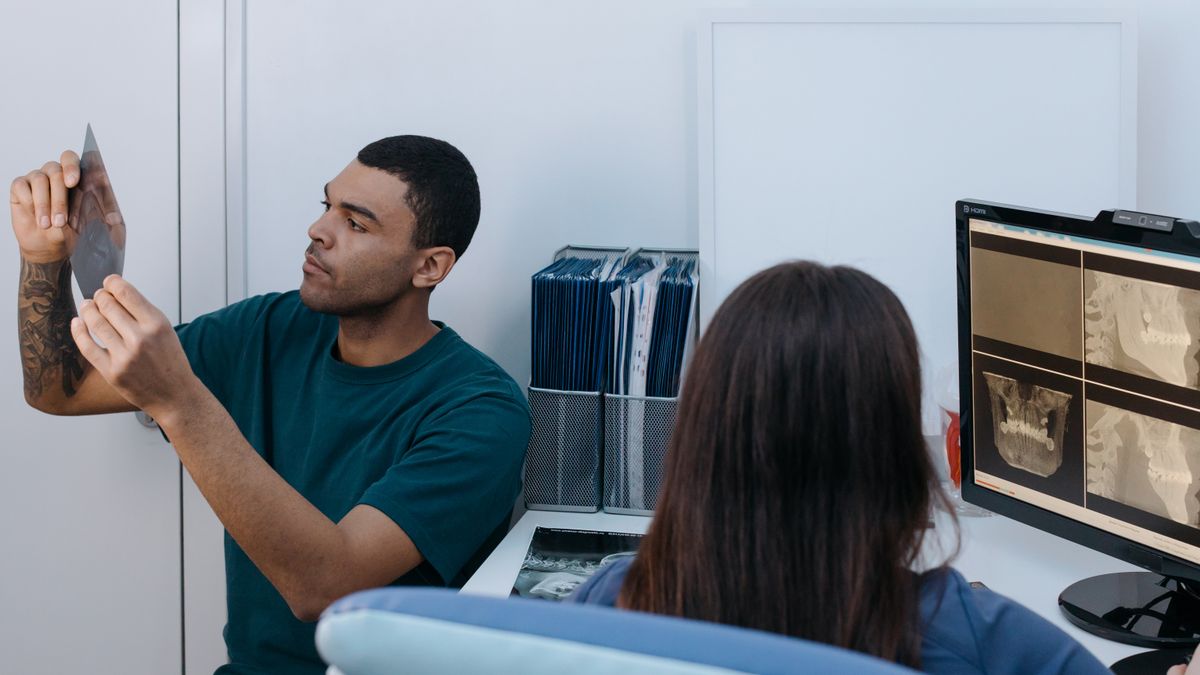 Dental x rays being reviewed on a monitor