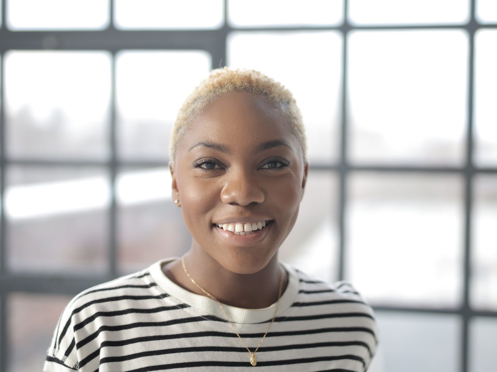 A woman with a healthy, confident smile
