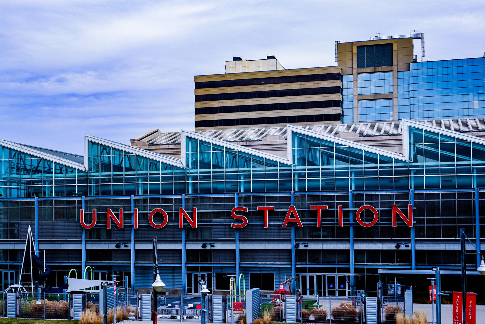 Exterior view of Union Station in Kansas City showcasing modern glass architecture and vibrant cityscape