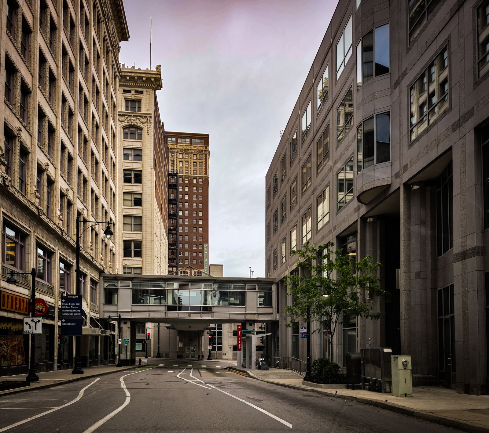 Empty street in downtown Kansas City, Missouri featuring historic and modern architecture