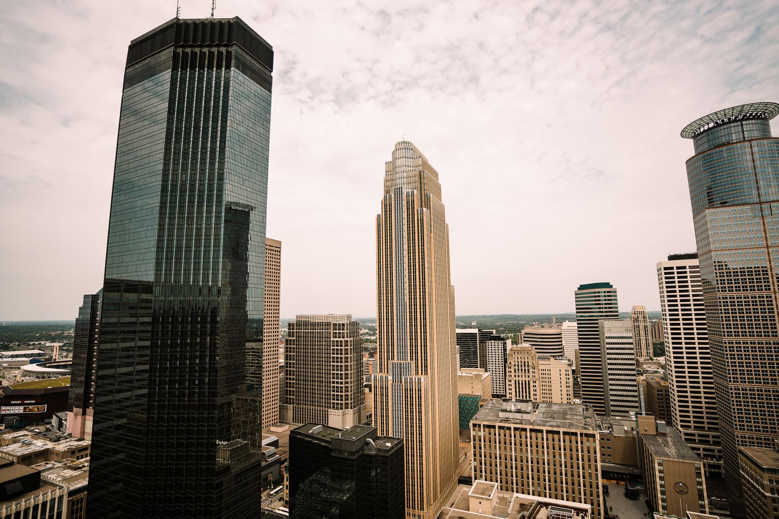 Aerial view of Minneapolis skyline featuring Wells Fargo Center and other skyscrapers